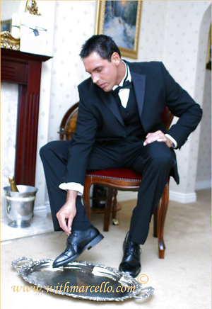 Sexy stud Marcello pours champagne over his feet and then wanks