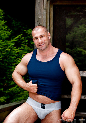 Mature bodybuilder posing naked by Colt Studio image 2