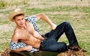 Zach Alexander shows his hairy muscled body outdoors
