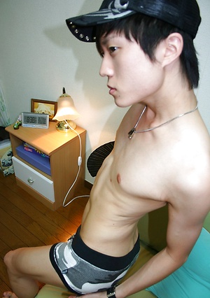 Cute Korean boy playing with his sex toy while jerking off