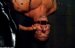 Muscular stud Adam Knox gets tied up, waxed, flogged and fucked by Nick Moretti in Slick it Up gear.