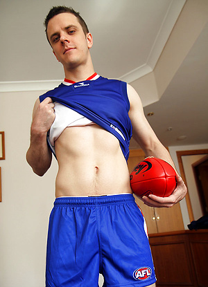 Aussie boy Brent Tyler strips of of his Footy Gear