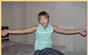 Cute and young Mui Mui strips off