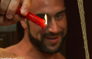 Spencer Reed dominates and fucks Tony Hunter in tight bondage.