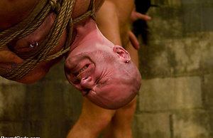 Three muscle studs get a hard worked over by Van Darkholme.