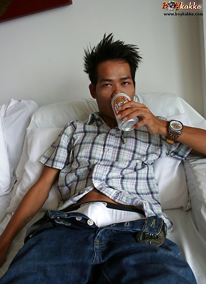 Cute Asian boy sipping beer before guzzling cum