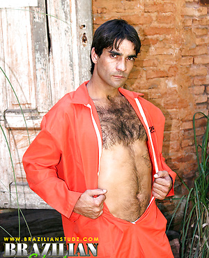 Miguel Torres posing naked outdoors