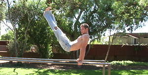 Flexible jock Neal exhibits his long dick after he strips naked