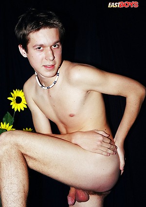 Nice looking twink posing naked
