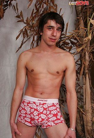 Cute toned twink gets naked