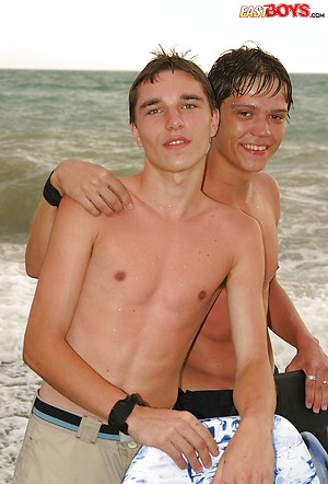 Cute twinks on a beach