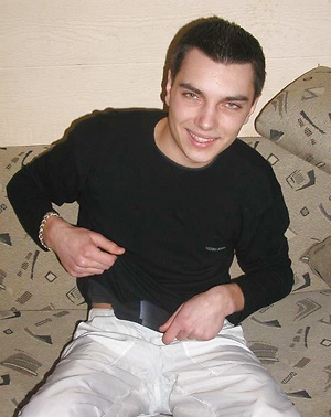 He peels off his sweet blue undies to reveal a great uncut cock.