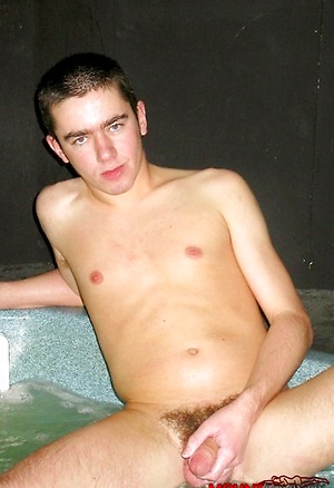Cute young Twink jerks off in a hot tub