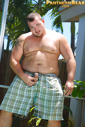 Chubby dude Hunter posing outdoors