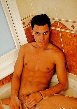 Sexy twink Tino takes a bath and then a shower and shows off his long boy-cock.