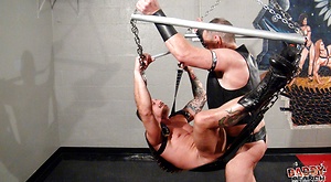 Leather clad daddies teaste each other's cocks and explore their hairy assholes