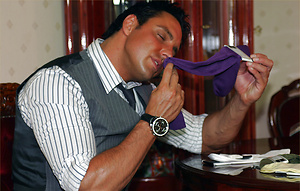 Hunky Marcello has bought a new pack of silky socks, he sniffs one pair as he shoots his load on another
