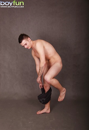 Cute boy Jace Bryant busts a nut over his stomach.
