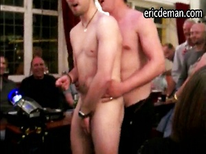 Two straight rugby players are dared to perform dance with each other.