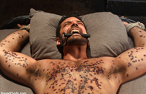 Mr Wilde binds and fucks a muscled body builder with an uncut cock