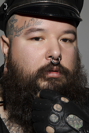 Tattooed Chub has a bearded baby face and a daddy's attitude...