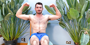 Hairy Young Muscular Hunk Wanks his Big Uncut Cock & Shoots Cum all over his Shorts!