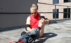 Australian lad Shane Phillips strips on a roof