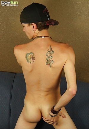 Cute college boy Danny Bowman jerking off on sofa.