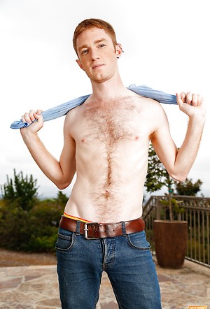 Smiling red haired ginger Seamus O'Rilley strips outdoors to show his twink body and hard dick